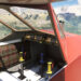 Castel C.25S flying over mountains in Microsoft Flight Simulator